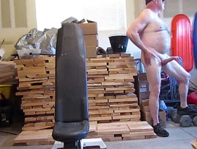 Naked and hard in the open garage. indonesia gay porn