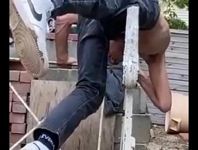 Stretching and Twisting on wrought iron railing in unaccompanied jeans for Pain Relief hot louring gay porn video